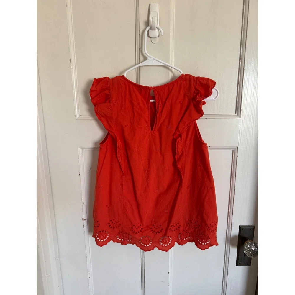 Kate Spade orange ruffle‎ sleeve eyelet top size medium